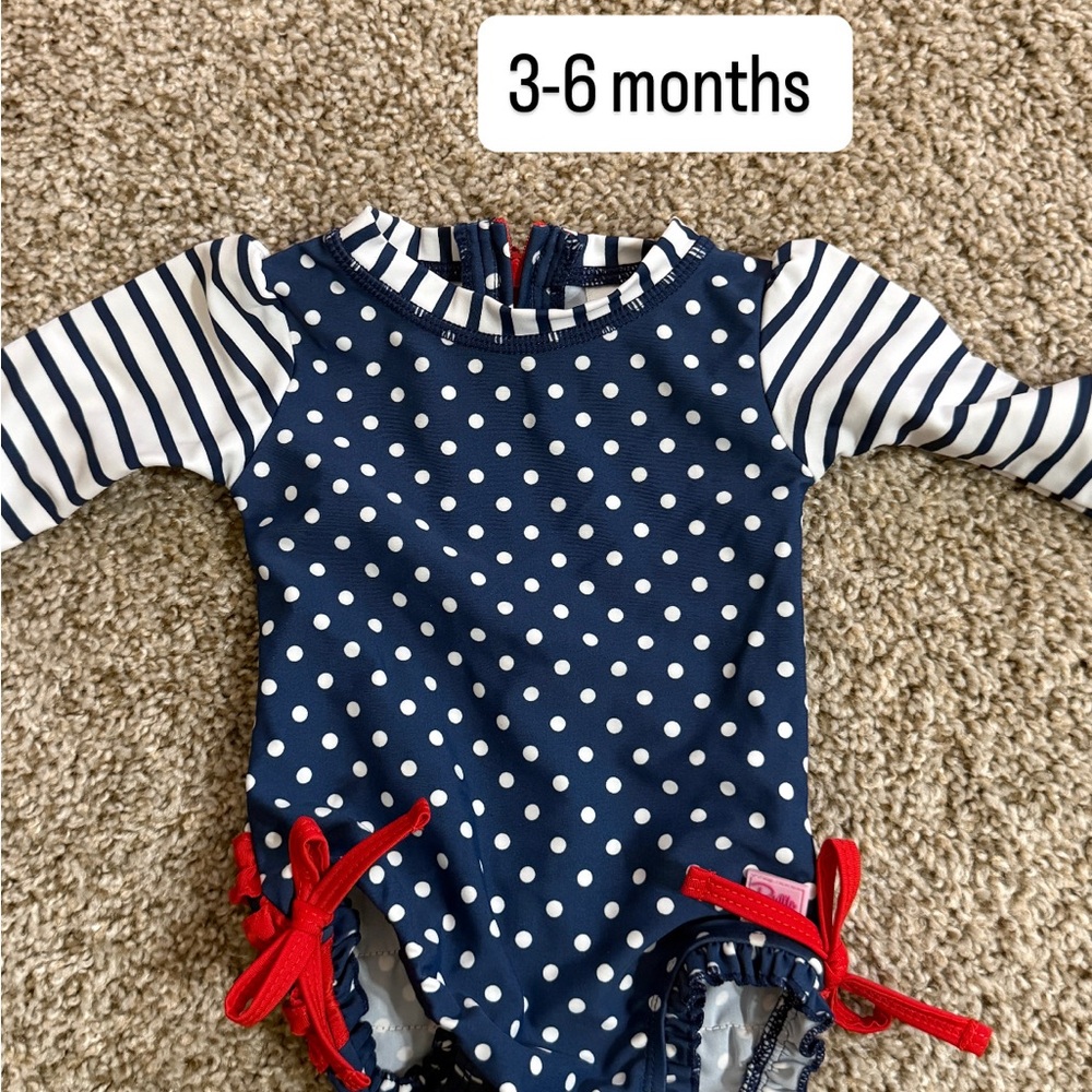 Ruffle Butts Navy and White Polka Dot Bodysuit